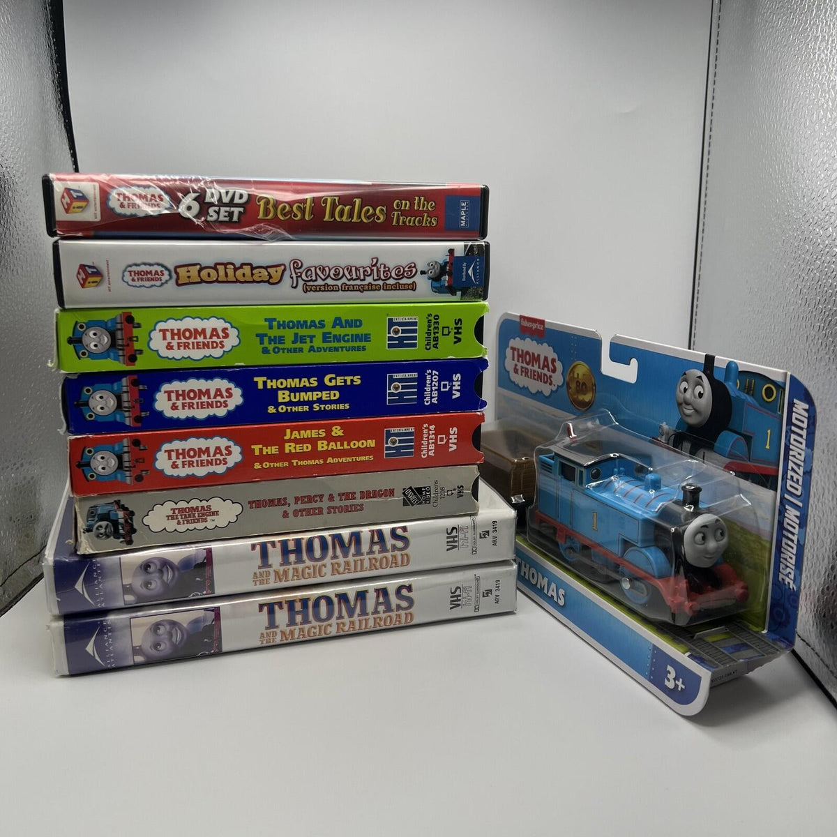 Assorted Thomas & Friends DVDs, VHS Tapes, & TrackMaster Motorized Thomas Lot #4
