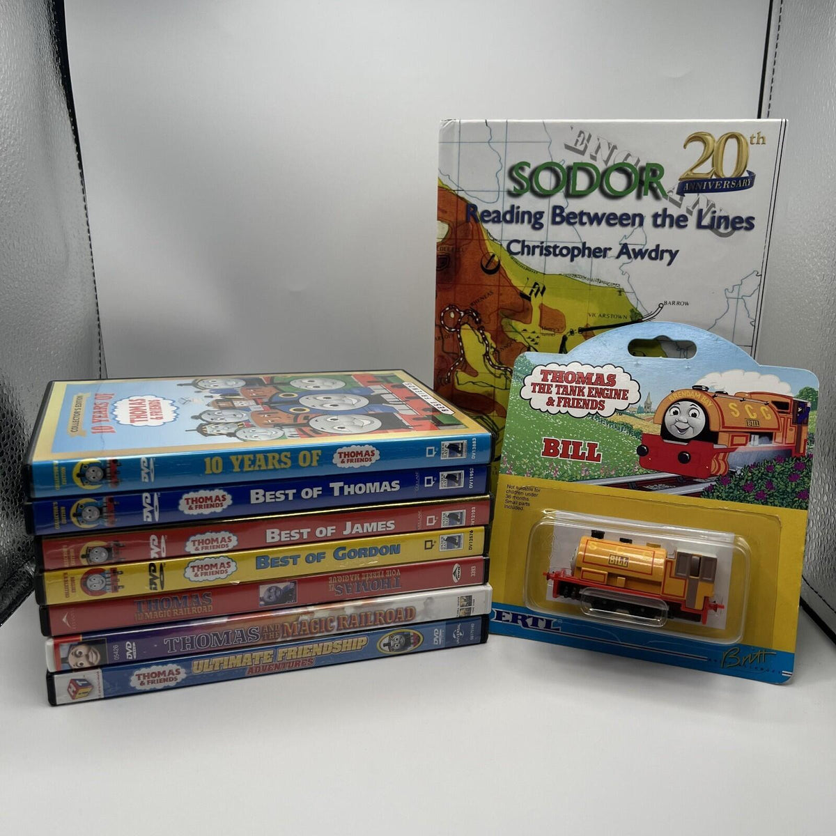 Assorted Thomas & Friends DVDs, Reading Between the Lines, & ERTL Bill Lot #5